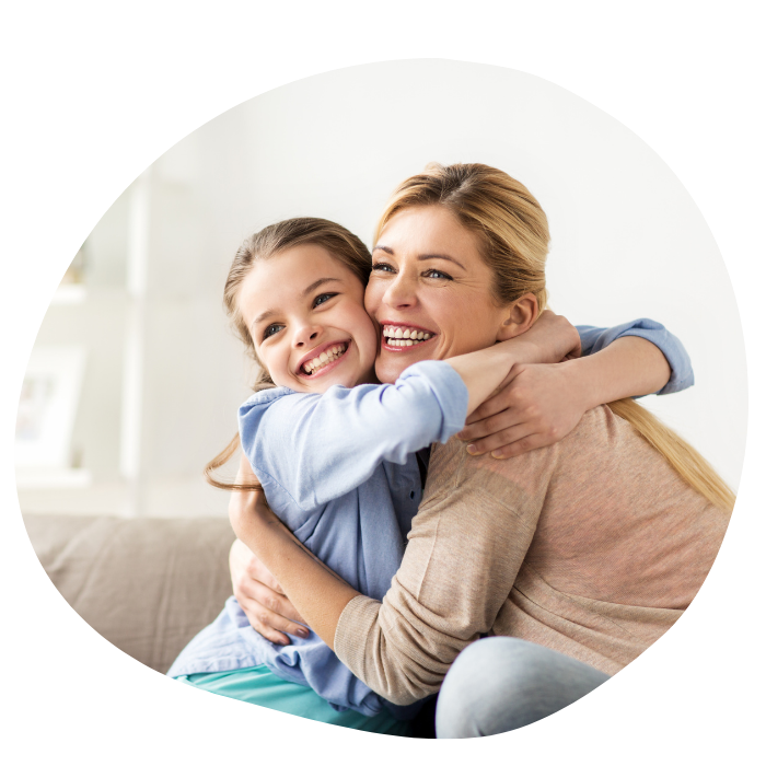 Mother daughter hugging smiling Mother daughter hugging.